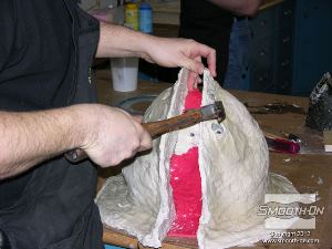 לחיצה להגדלת תמונה מסירים את מעיל התמיכה מפוליאוריתן קשיח Plasti-Paste.