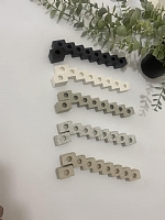 חנוכייה ייחודית מקוביות בטון שמאפשרת למספר את היום בחג