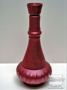 לחיצה להגדלת תמונה בקבוק שנעשה מפוליאוריתן Smooth-Cast ®300 ואבקת פיגמנט לאפקטים מיוחדים-  Cast Magic® Red Devil.