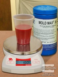 לחיצה להגדלת תמונה מודדים 100 גרם של המקשה.