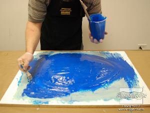 לחיצה להגדלת תמונה מורחים שכבה נוספת של סיליקון למריחה Rebound 40 עם פיגמנט אך לללא מסמיך על כל המגן ויוצרים כיסוי אחיד של החומר.