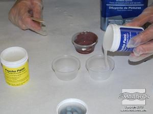 לחיצה להגדלת תמונה מודדים כמות שווה של מקשה Psycho Paint.