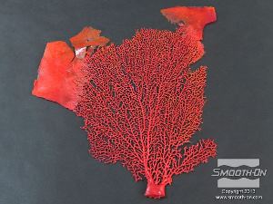 לחיצה להגדלת תמונה יציקת הפוליאוריתן קשיח למחצה Smooth-Cast® 60D מכילה גראדים (