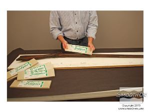 לחיצה להגדלת תמונה משתמשים בחימר על בסיס שמן כדי להכין מחיצת הפרדה מסביב לרובה.