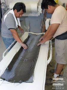 לחיצה להגדלת תמונה ממקמים את בד הפחם בתבנית.