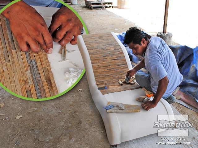 מוטות במבוק נחתכים ומושמים על גבי המודל.